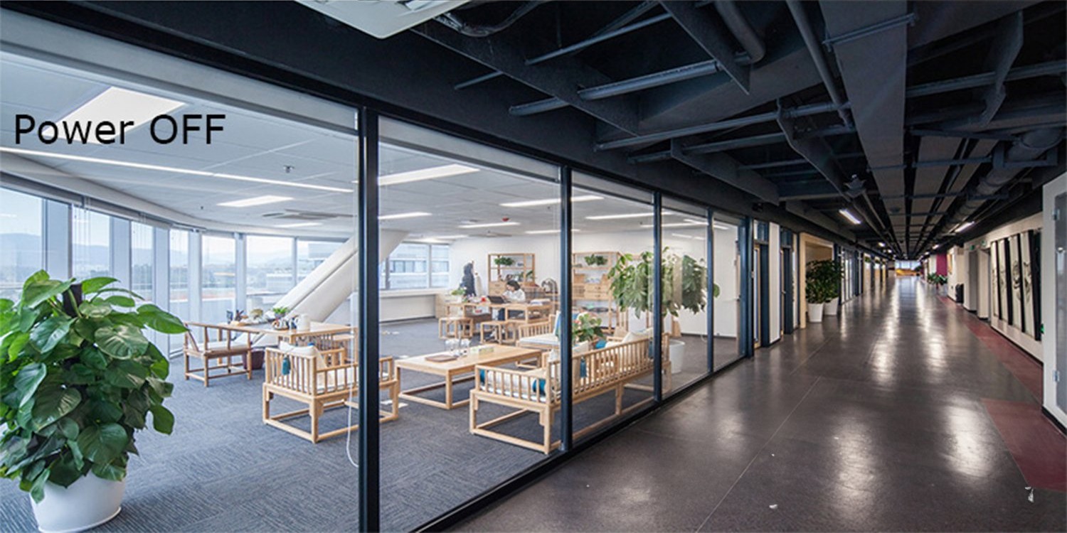 PDLC smart film in office corridor — Power OFF, clear state